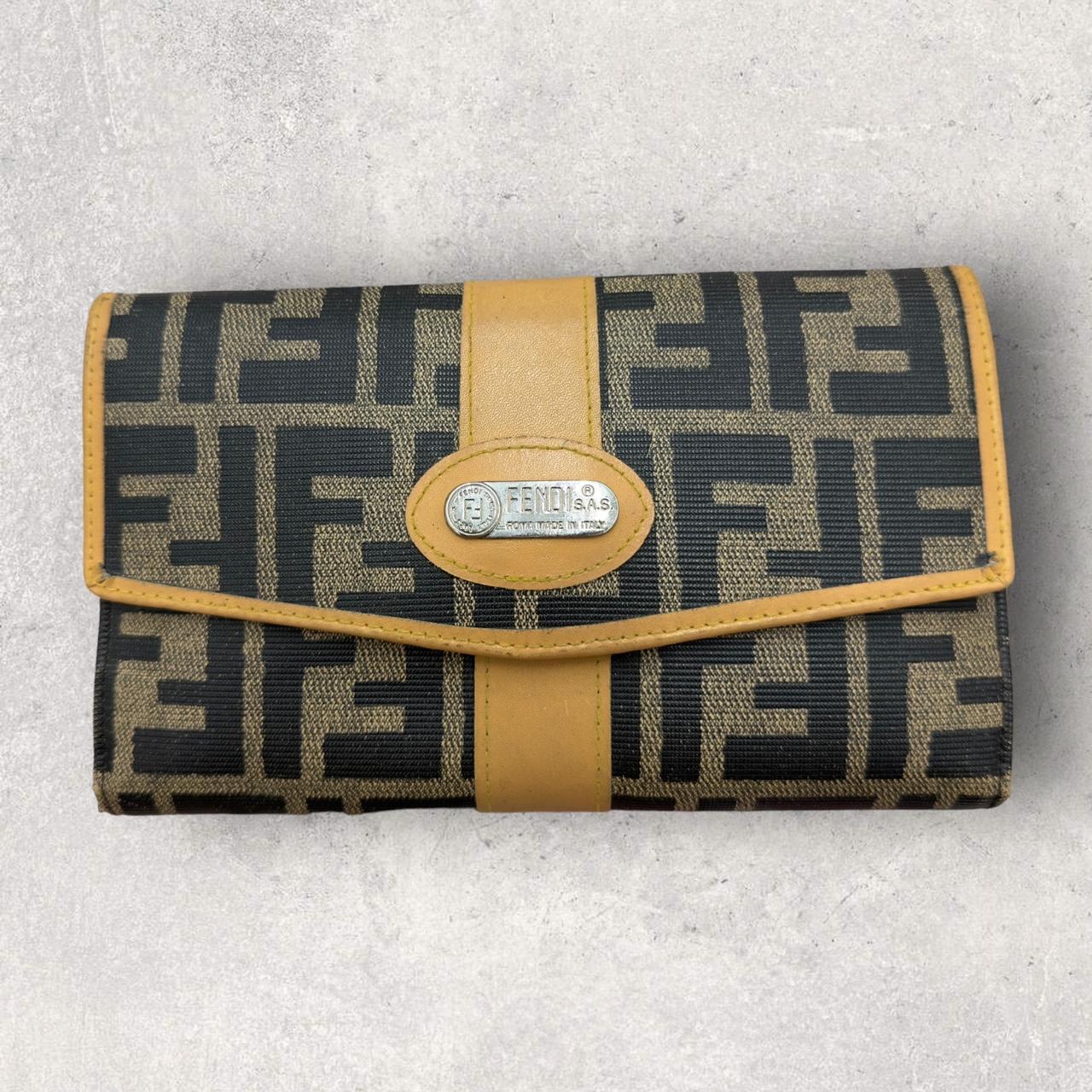 Vintage Fendi wallet in brown zucca print. From the Depop