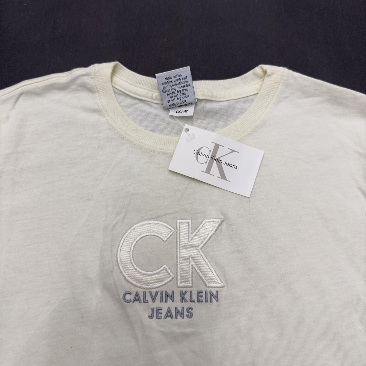 Vintage Calvin Klein Jeans tee in cream. From the - Depop