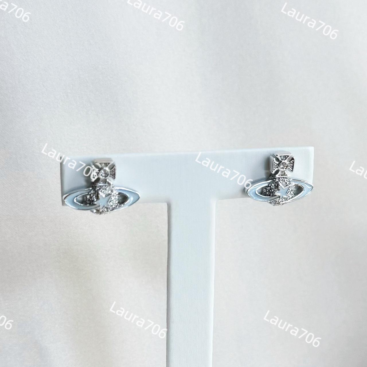 vivienne westwood blue star orb Saturn stud... Depop