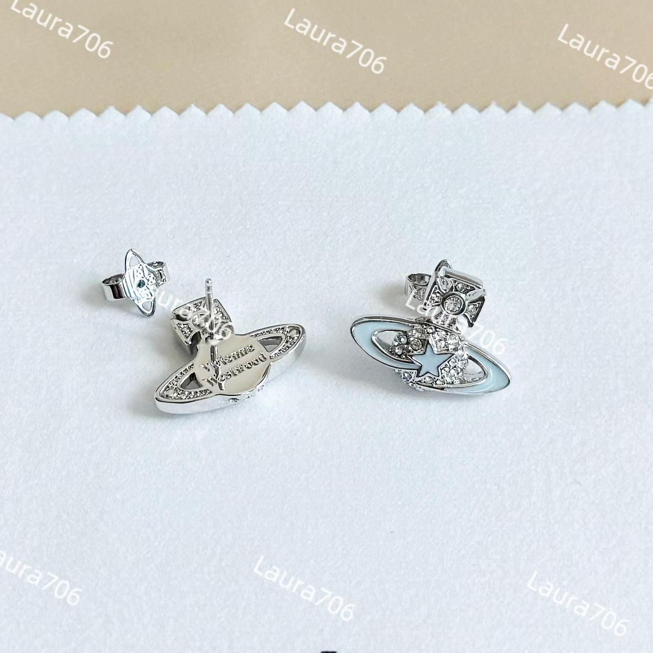 vivienne westwood blue star orb Saturn stud... Depop