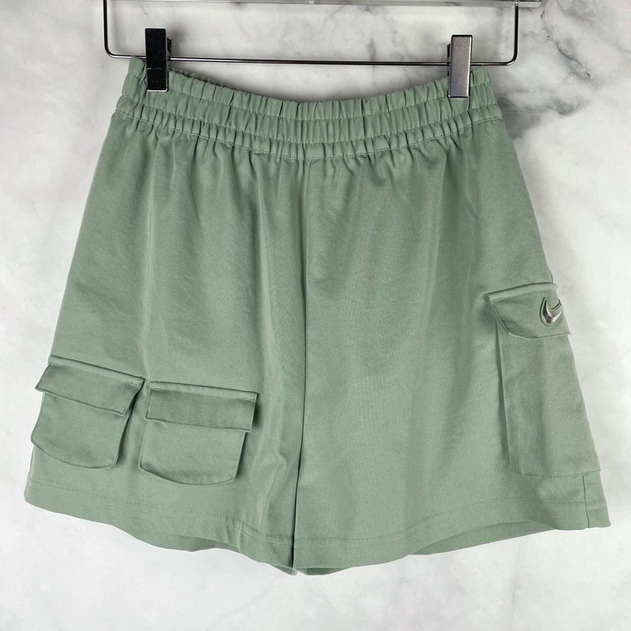 Nike oversized swoosh discount pocket green shorts