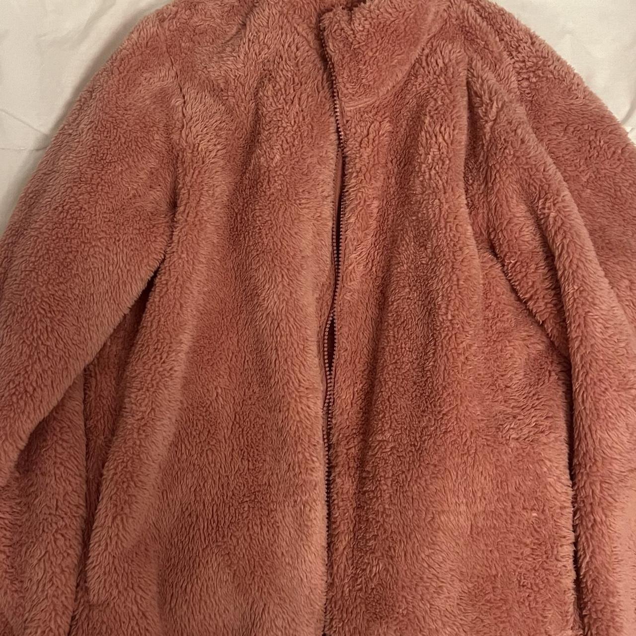Uniqlo pink fluffy fleece jacket, keeps very