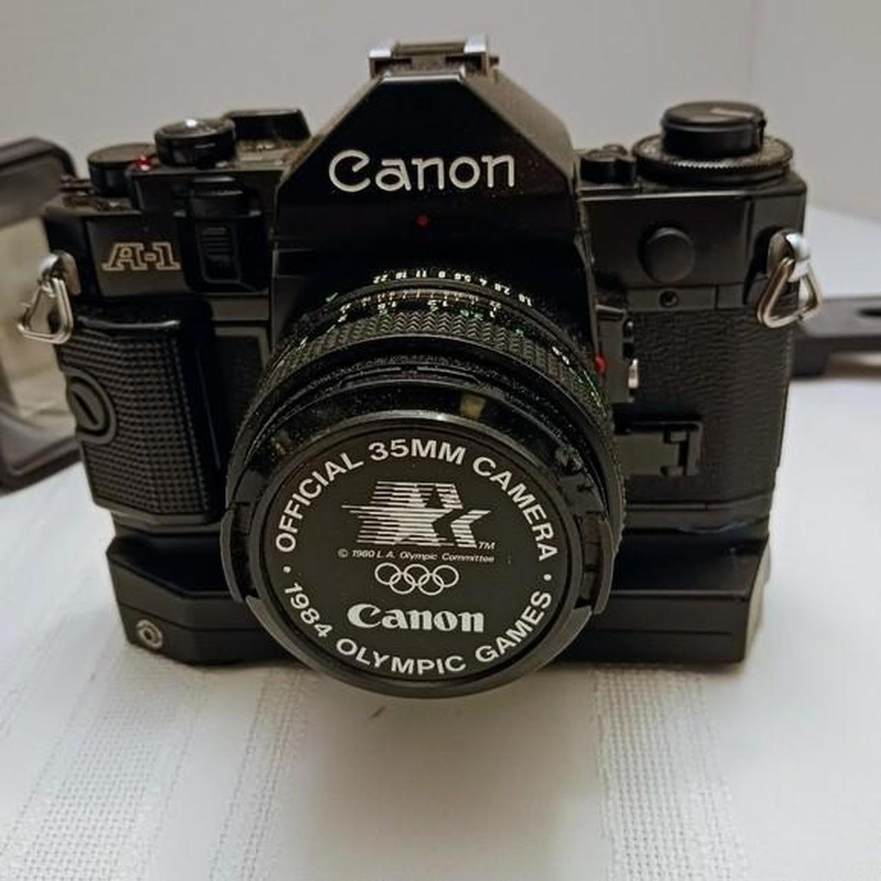 Canon A1 35mm Camera with lenses and flashes Vintage | Depop