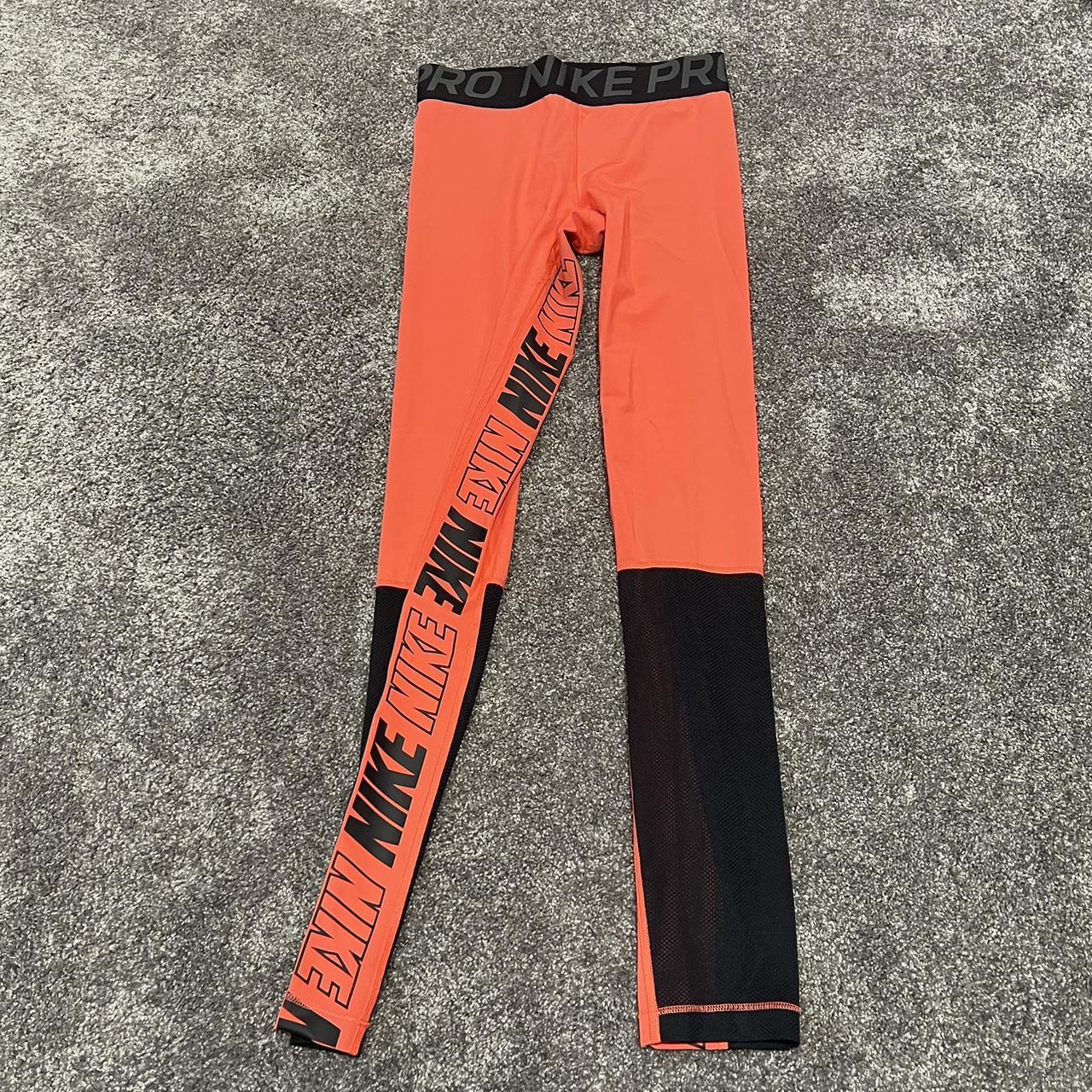 orange leggings nike