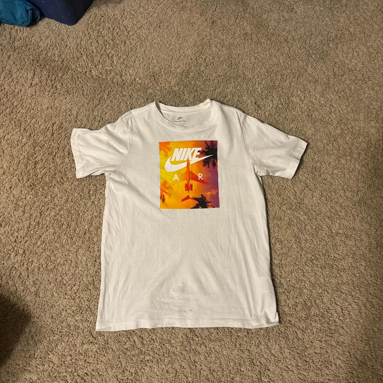 orange and white nike t shirt