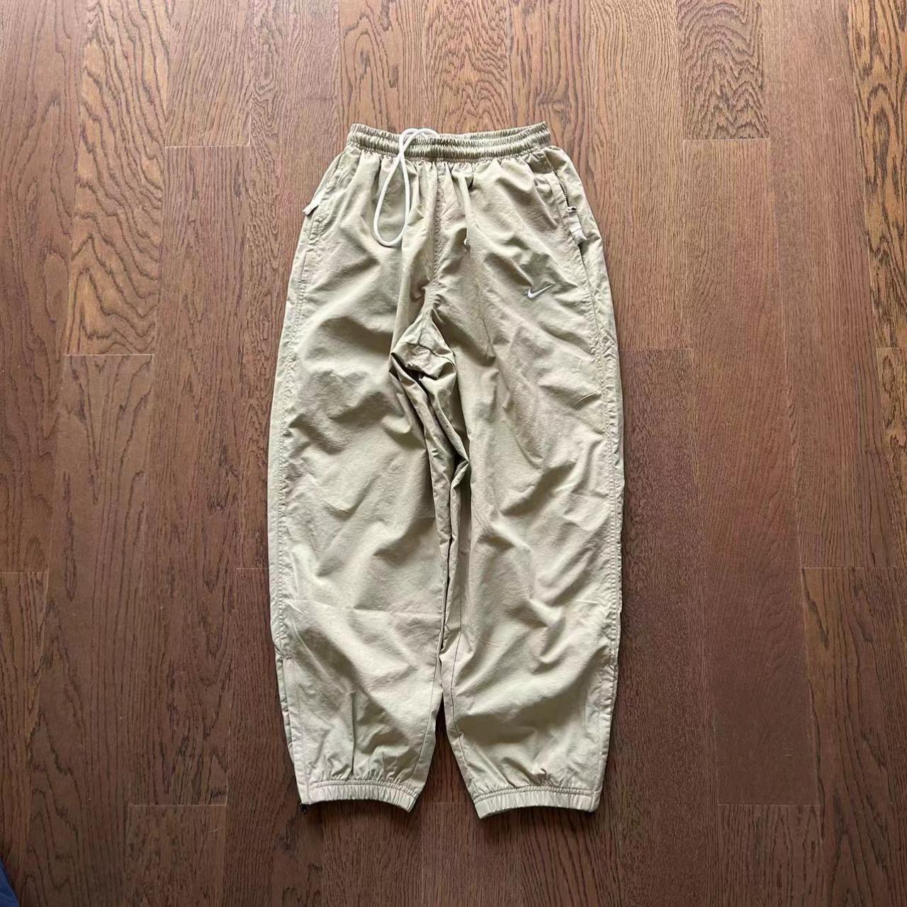 Cream Vintage Nike Track Pants in perfect condition... Depop