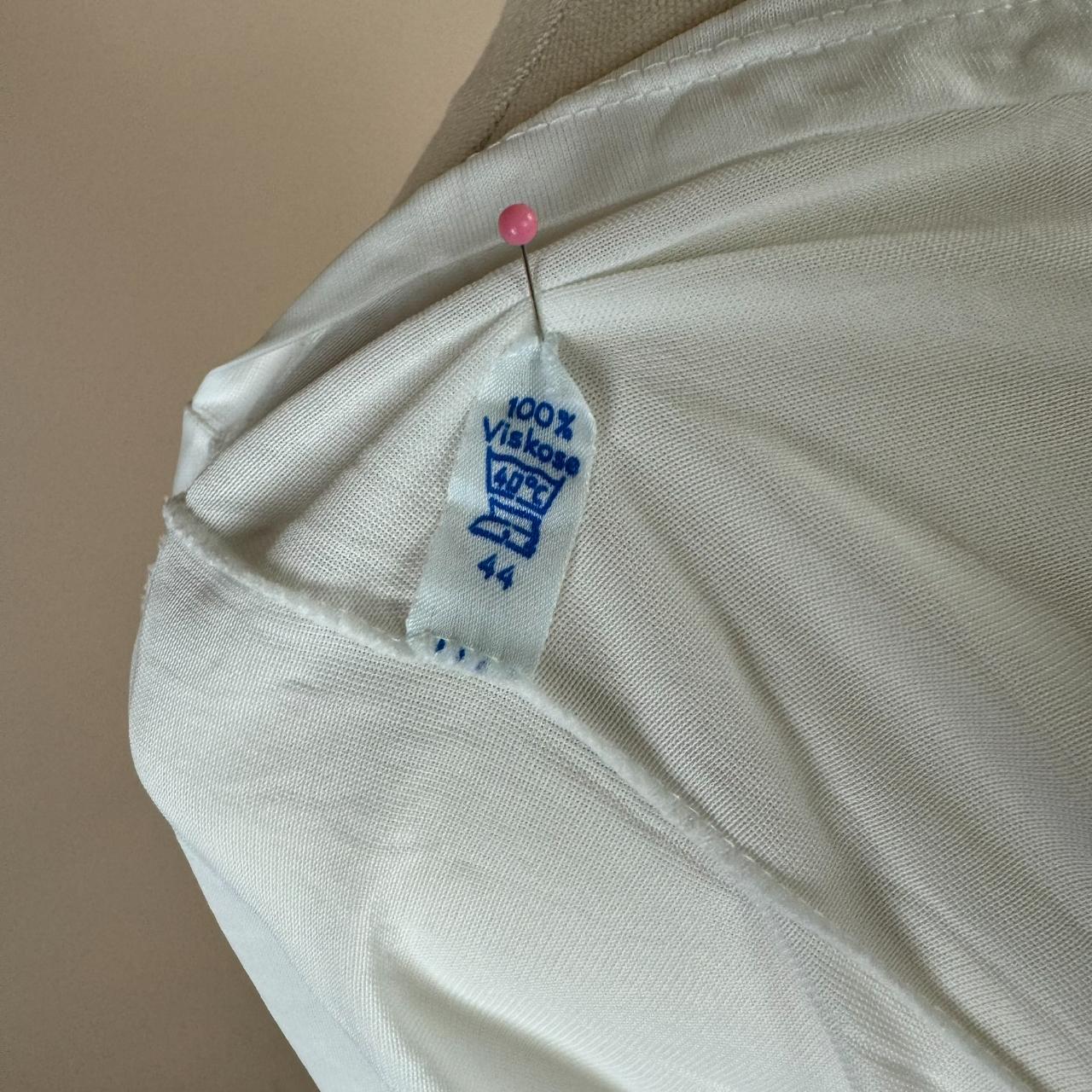 A beautiful vintage 1990s German slip dress in a... Depop