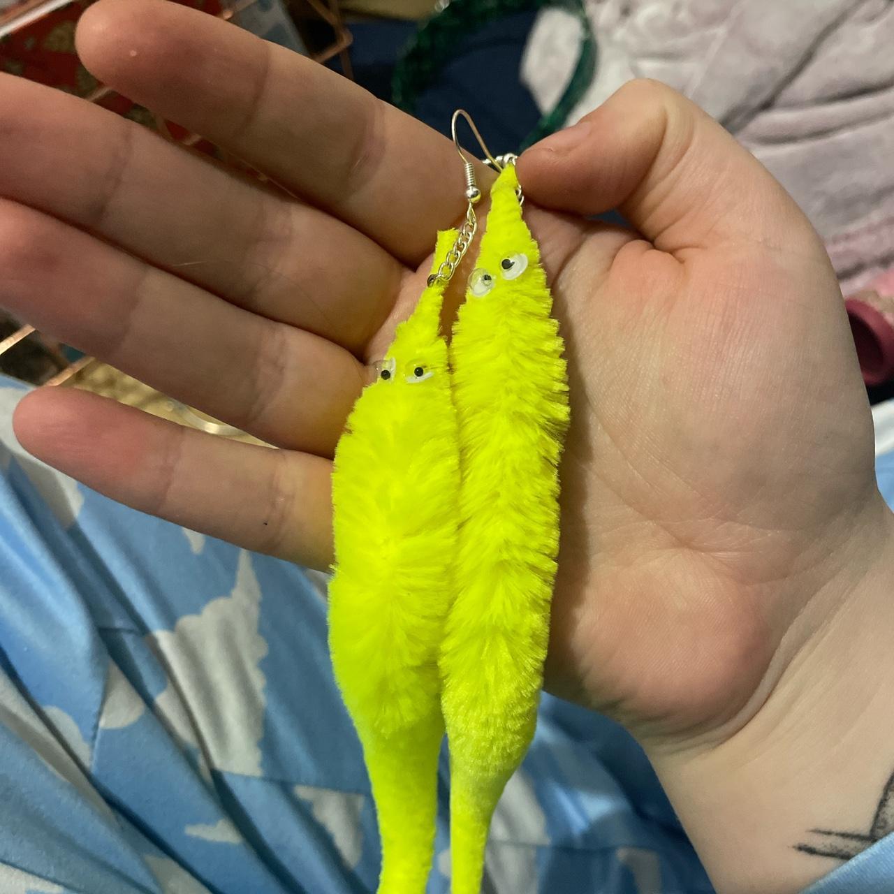 Pair of yellow worm on a string earrings never... - Depop