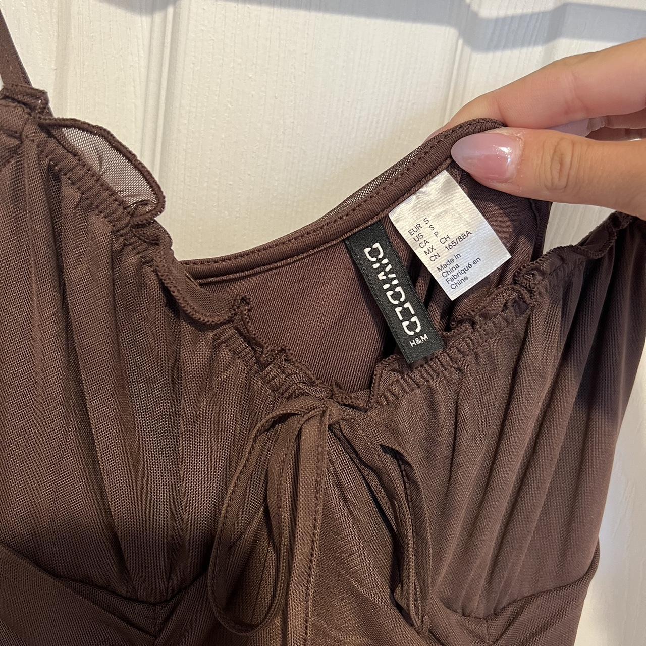 Small brown mini bodycon dress with tie front detail... Depop