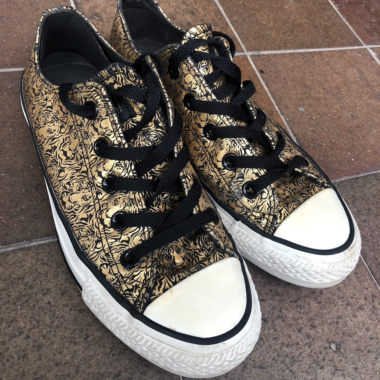 Ltd edition converse gold lion design size 4. Depop