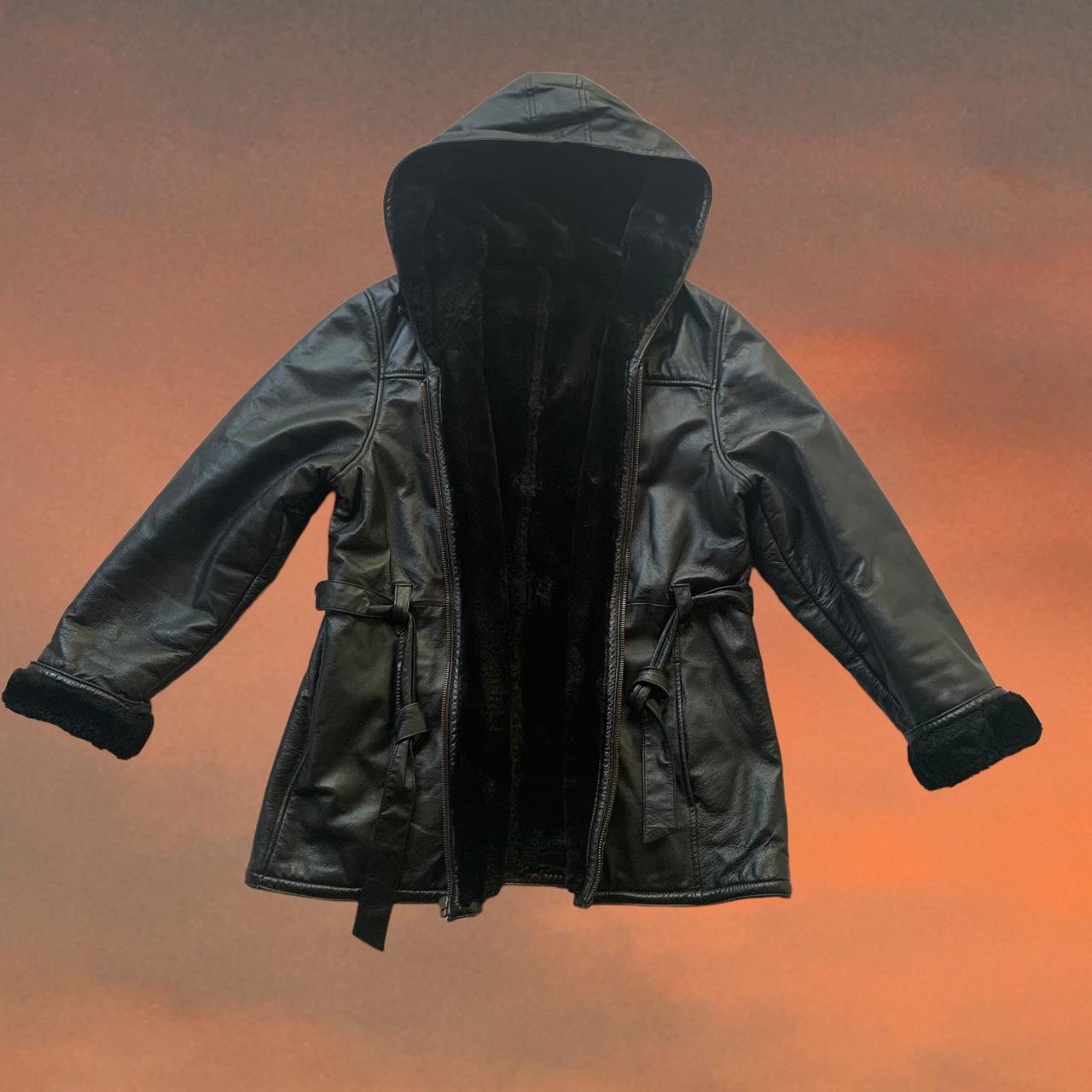 Black faux fur and leather heavy weight hooded coat... Depop