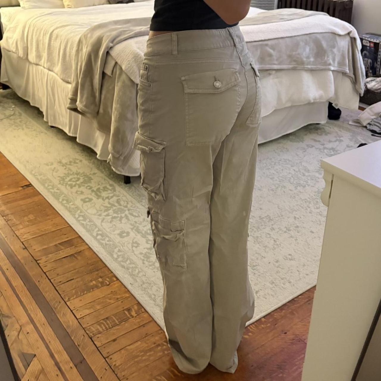 Cream Garage brand cargo pants with a low rise fit... Depop