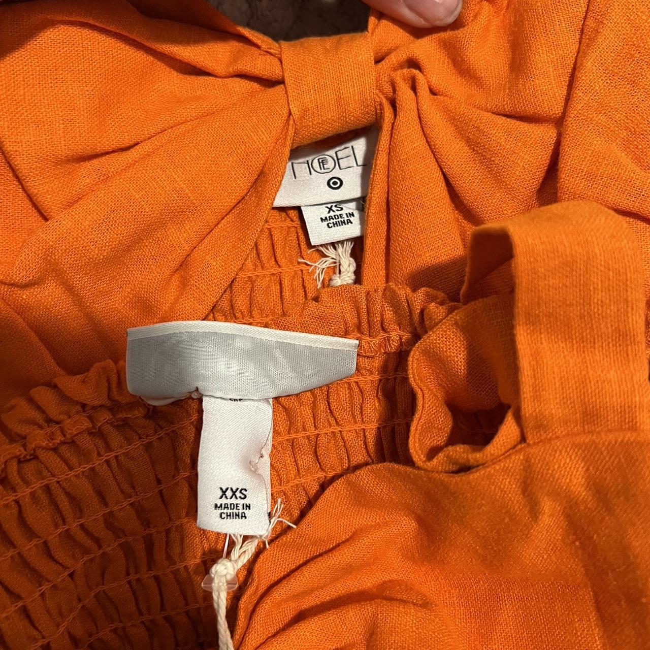 FeNoel x Target collab orange cut out dress. Have... Depop