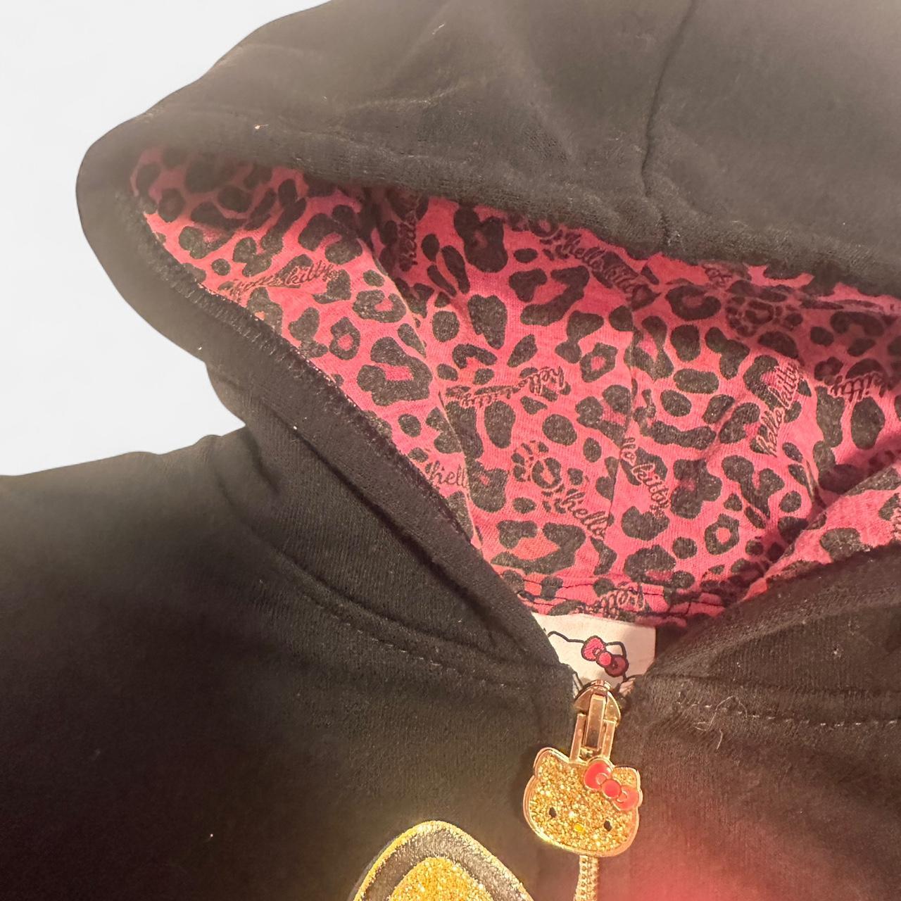 Black Hello Kitty zip up hoodie with pink leopard... | Depop