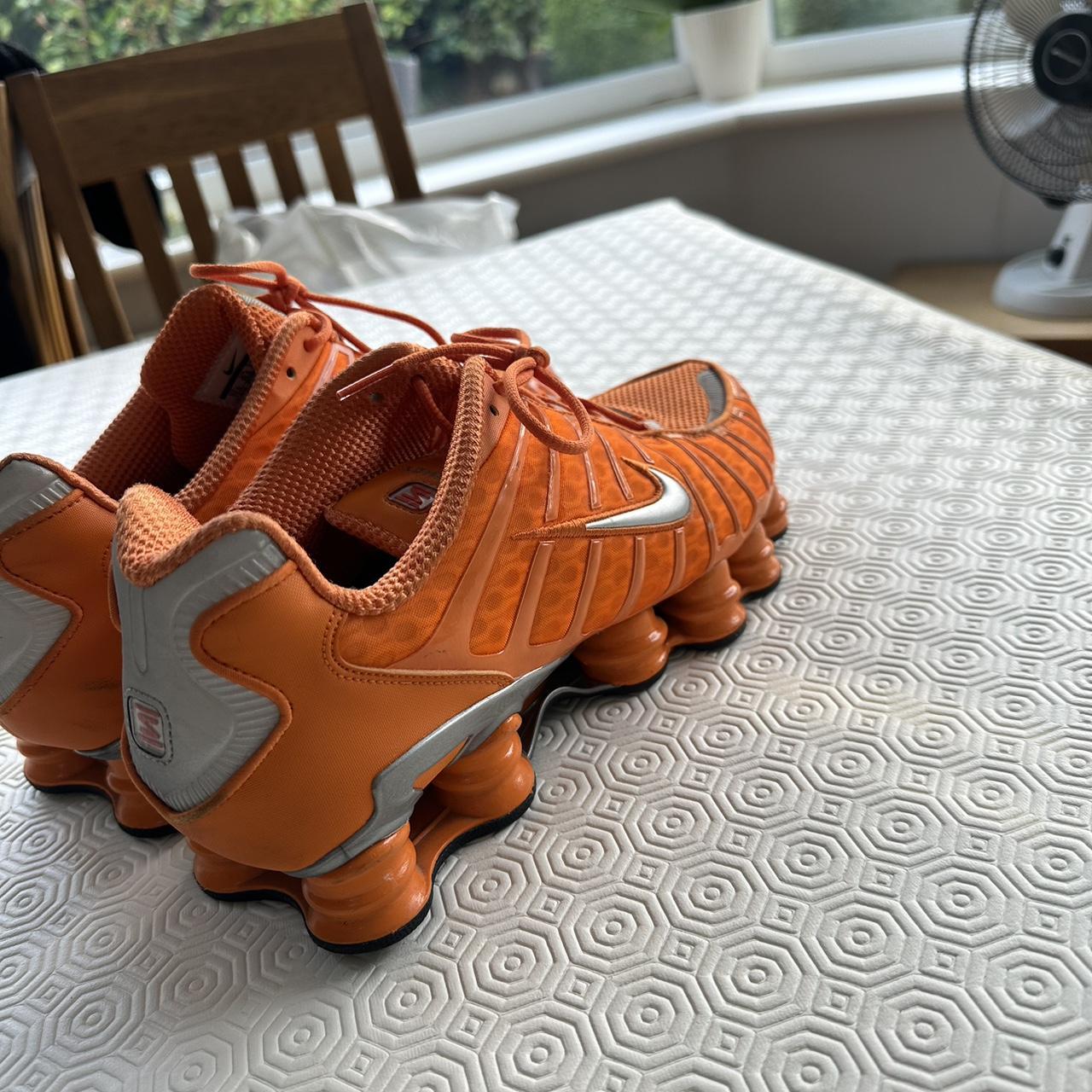 mens nike shox orange