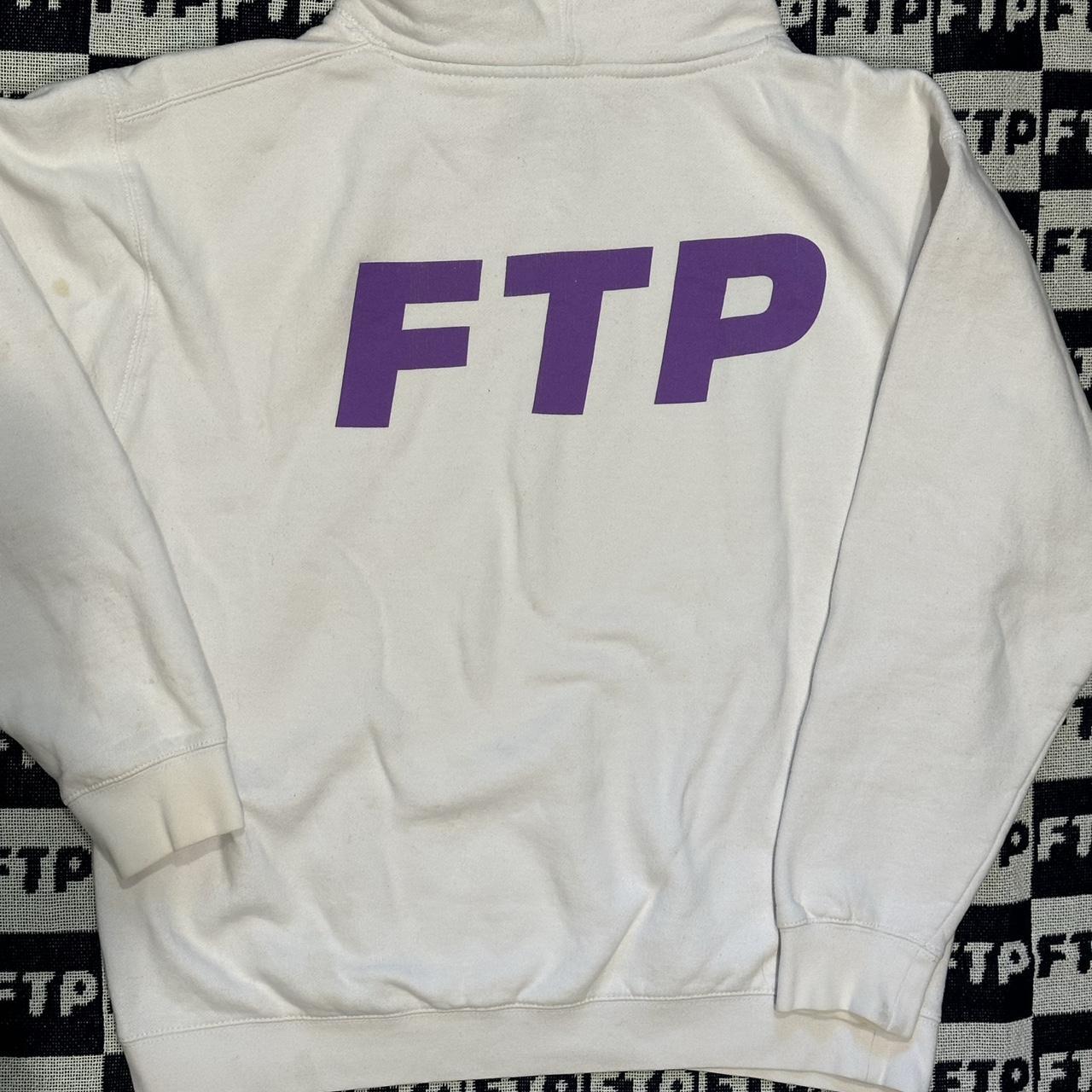 White and purple FTP logo hoodie. Small stains on it | Depop White and purple FTP logo hoodie. Small stains on it | Depop