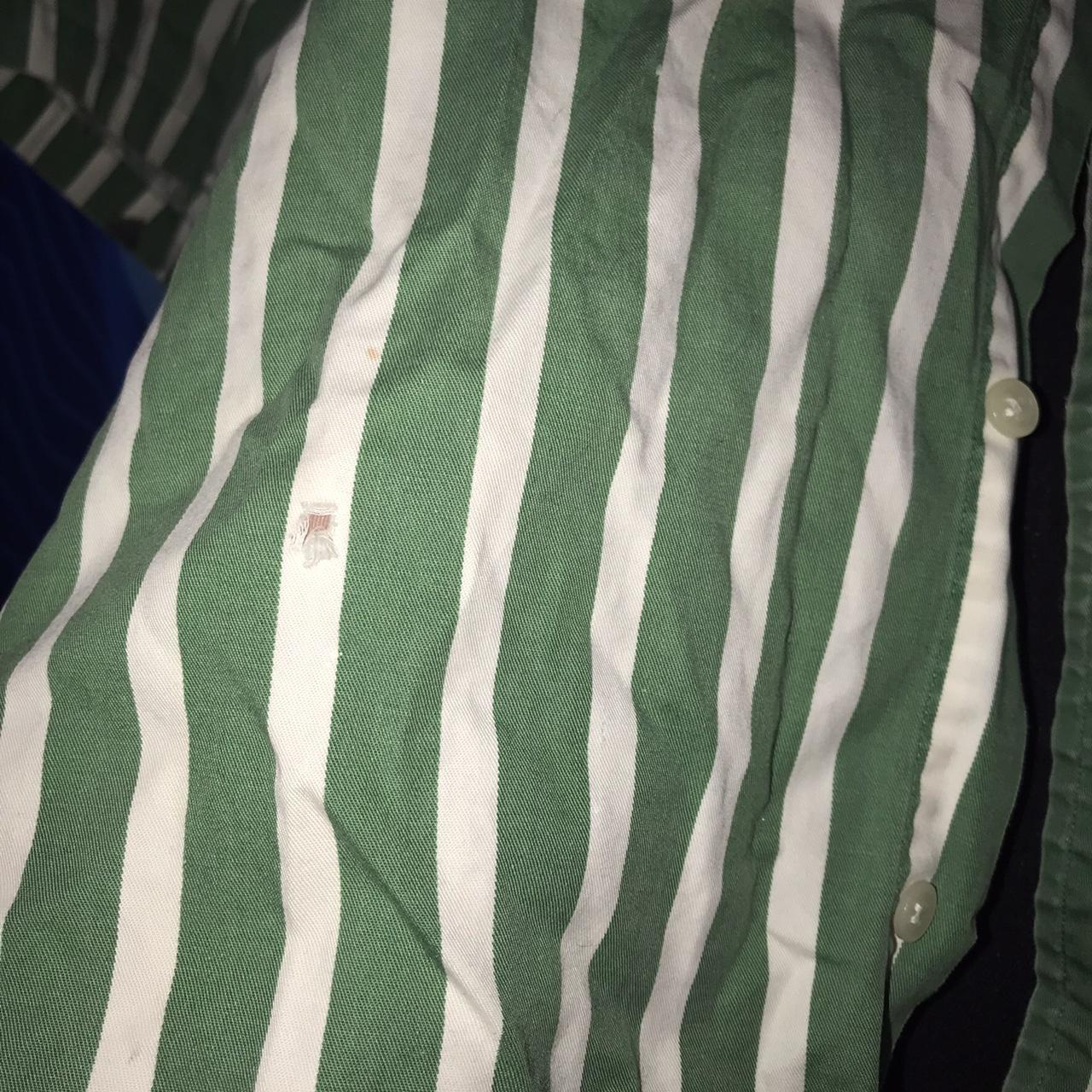 Keep it casual in this green and white stripped... - Depop