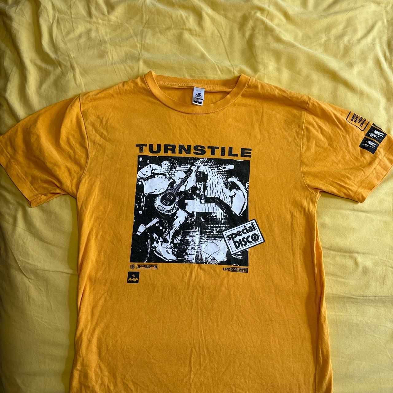 Size small yellow turnstile band t shirt in good... Depop