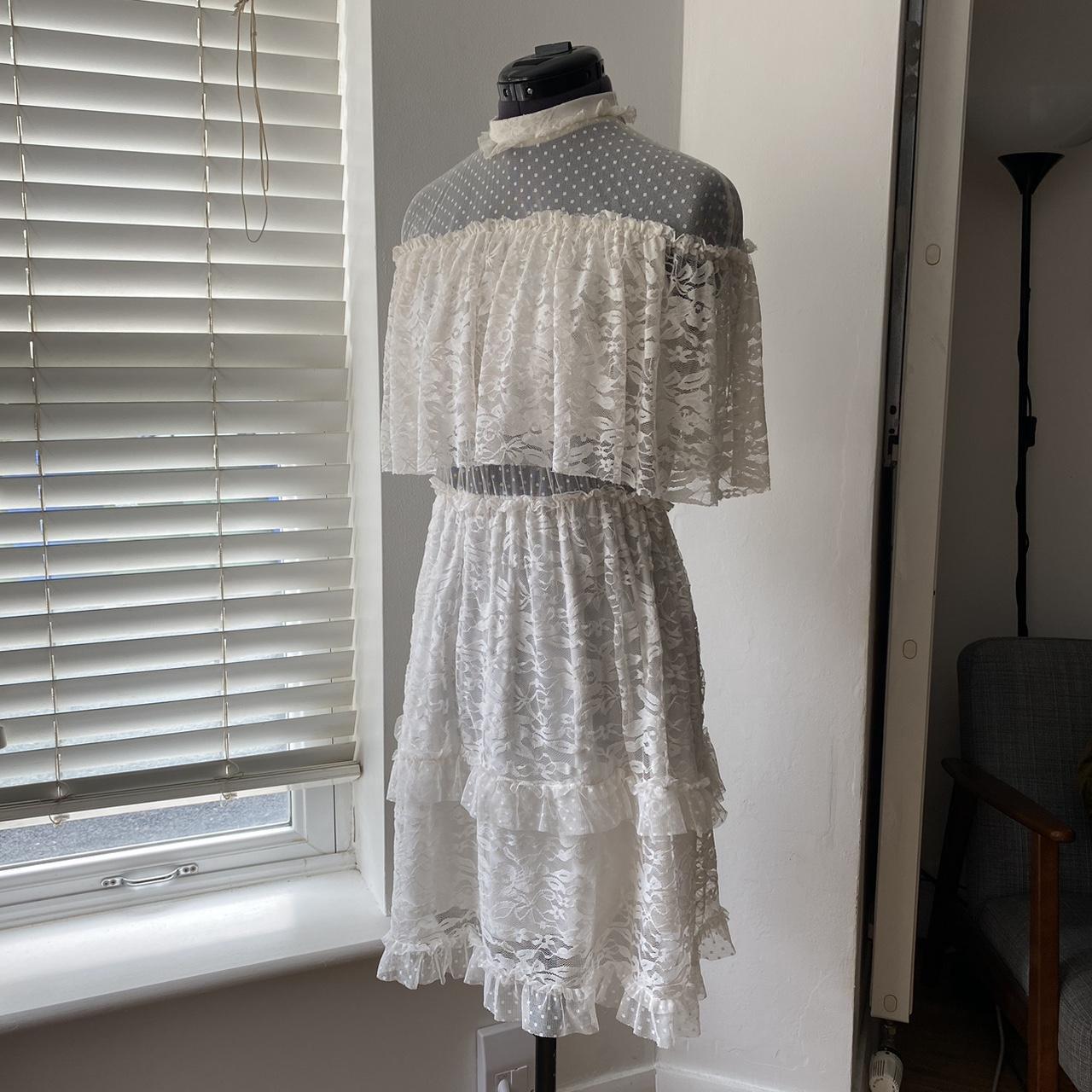 Frilled, lace mini white dress. Button up fastening... - Depop