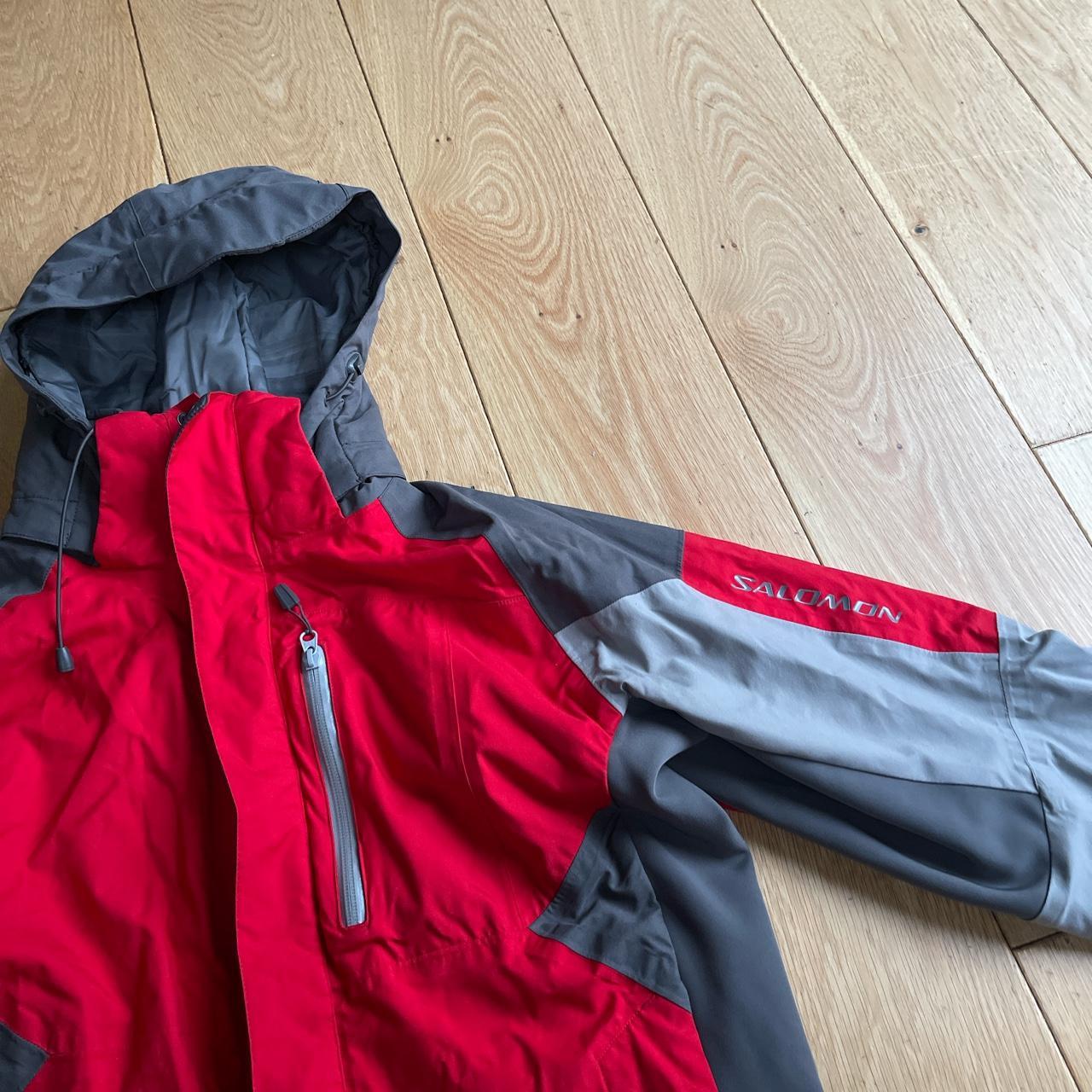 Red and grey men’s Salomon ski jacket with a ski... - Depop