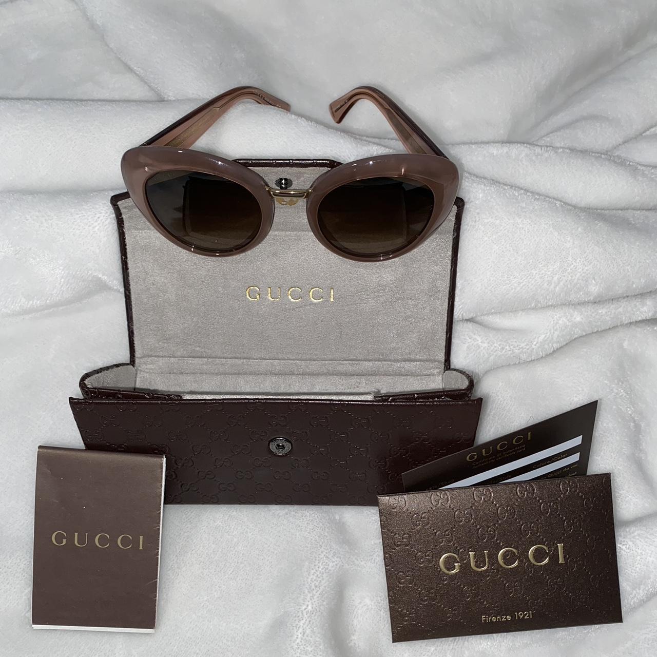 gucci sunglasses on face