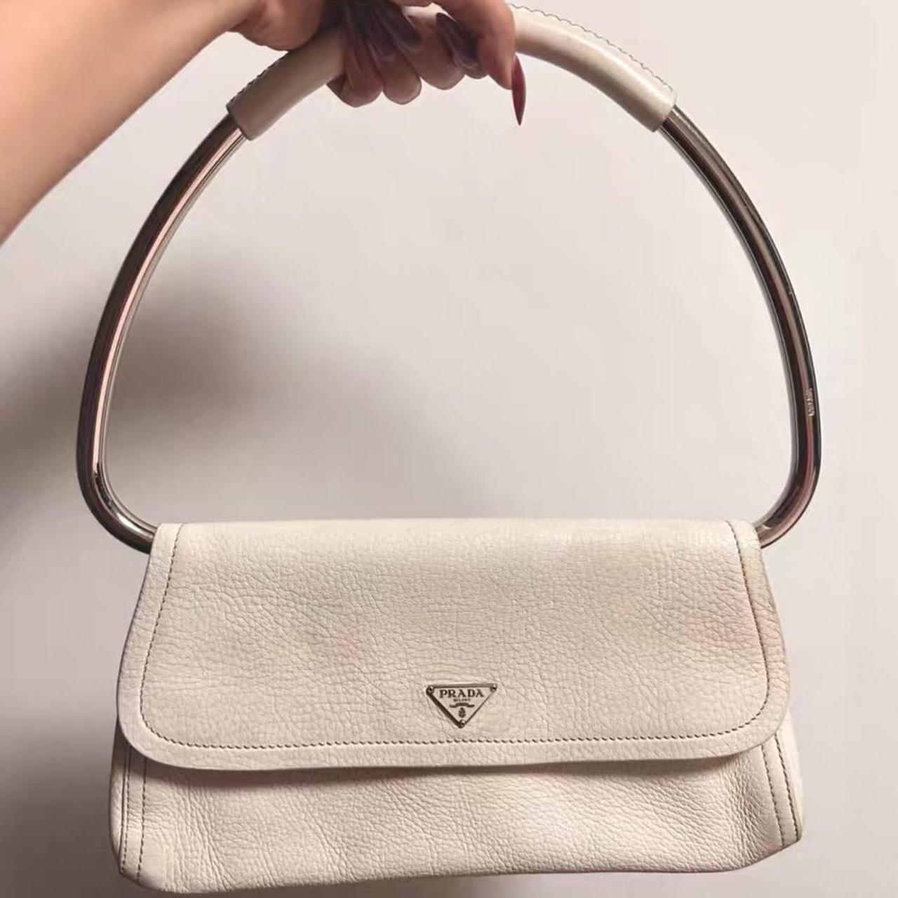 Prada metal handle bag best sale