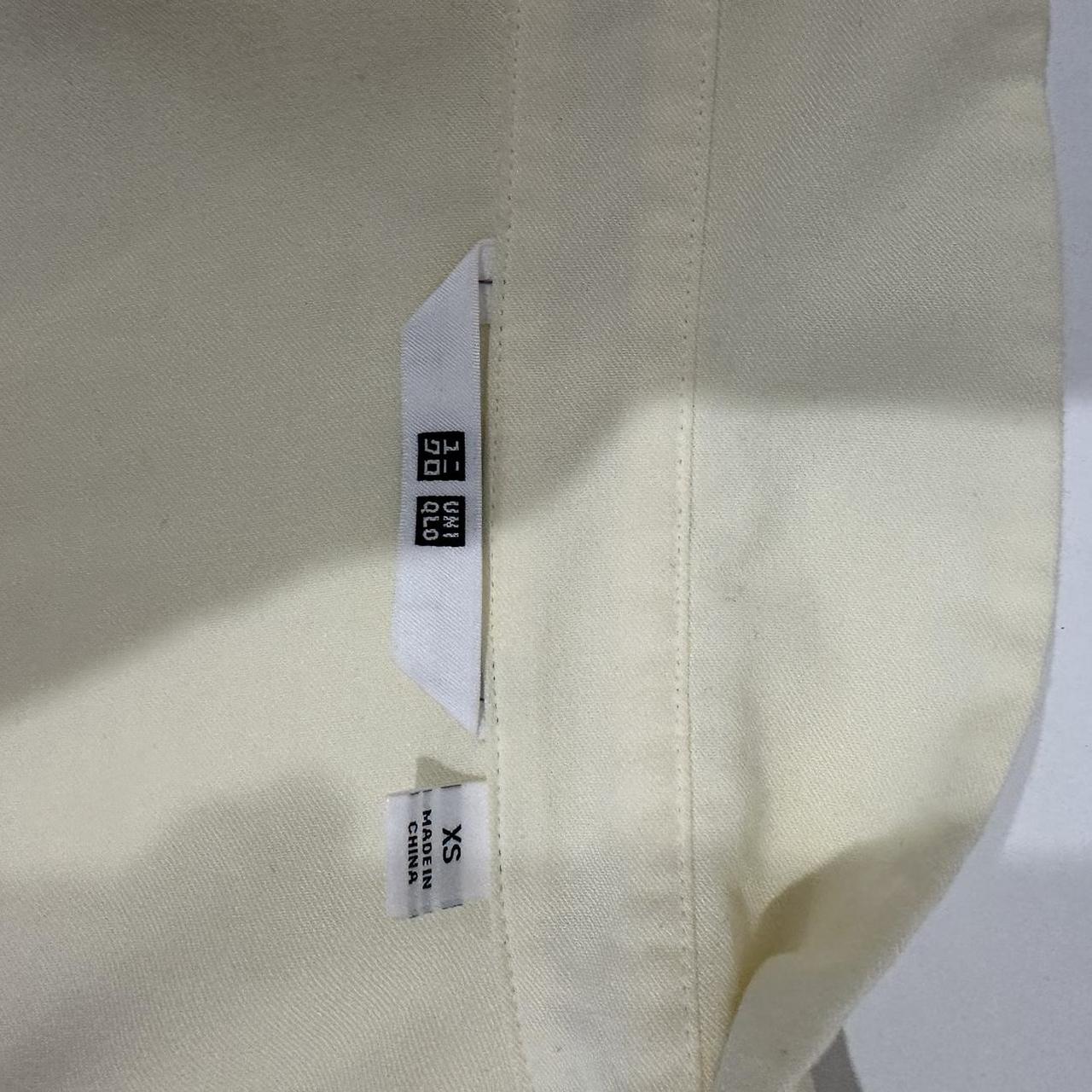 Uniqlo yellow button up - size XS - never worn,... - Depop