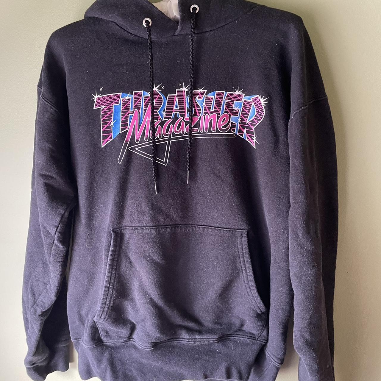 Black Thrasher hoodie with a cute 80s style logo I