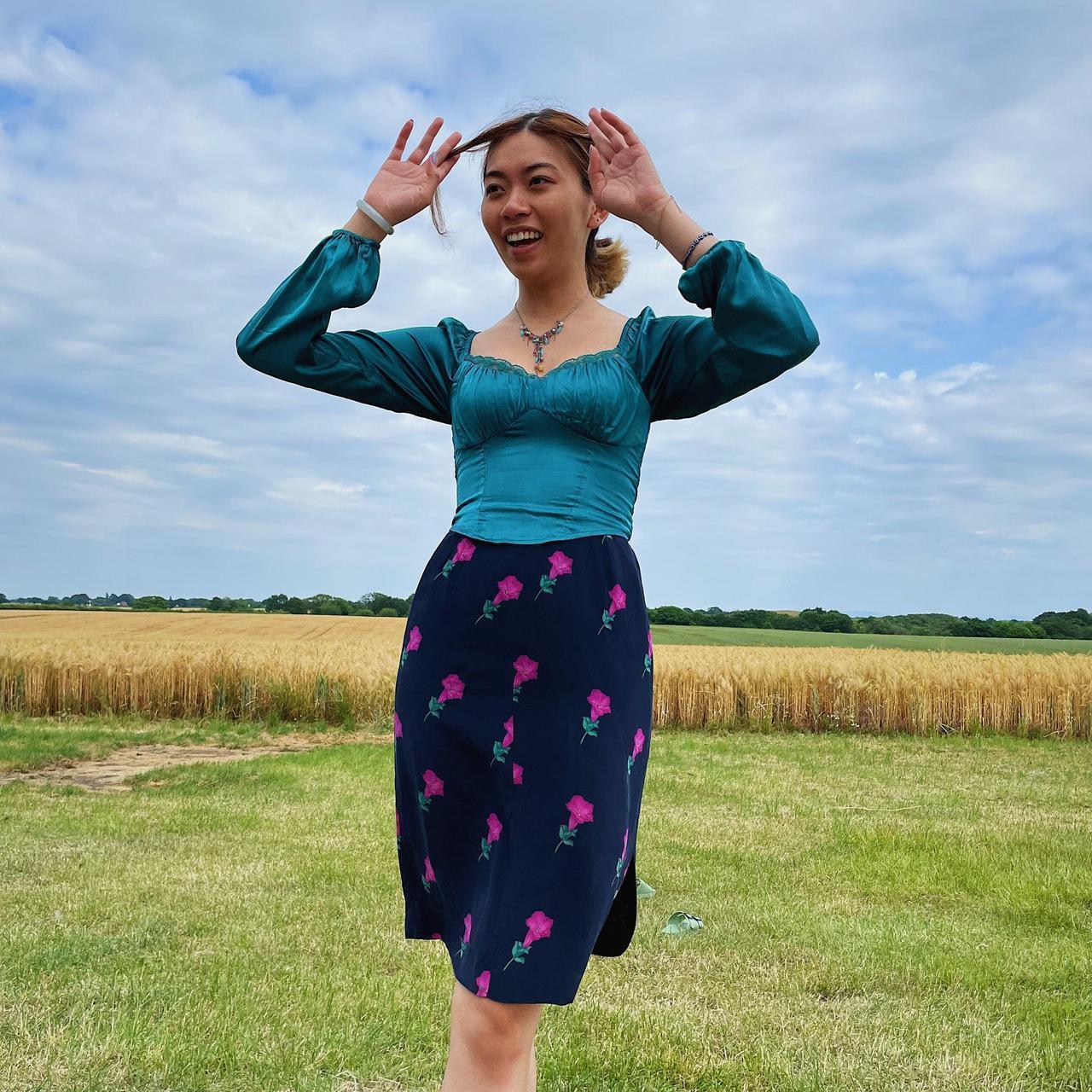 Navy blue skirt pink flowers best sale