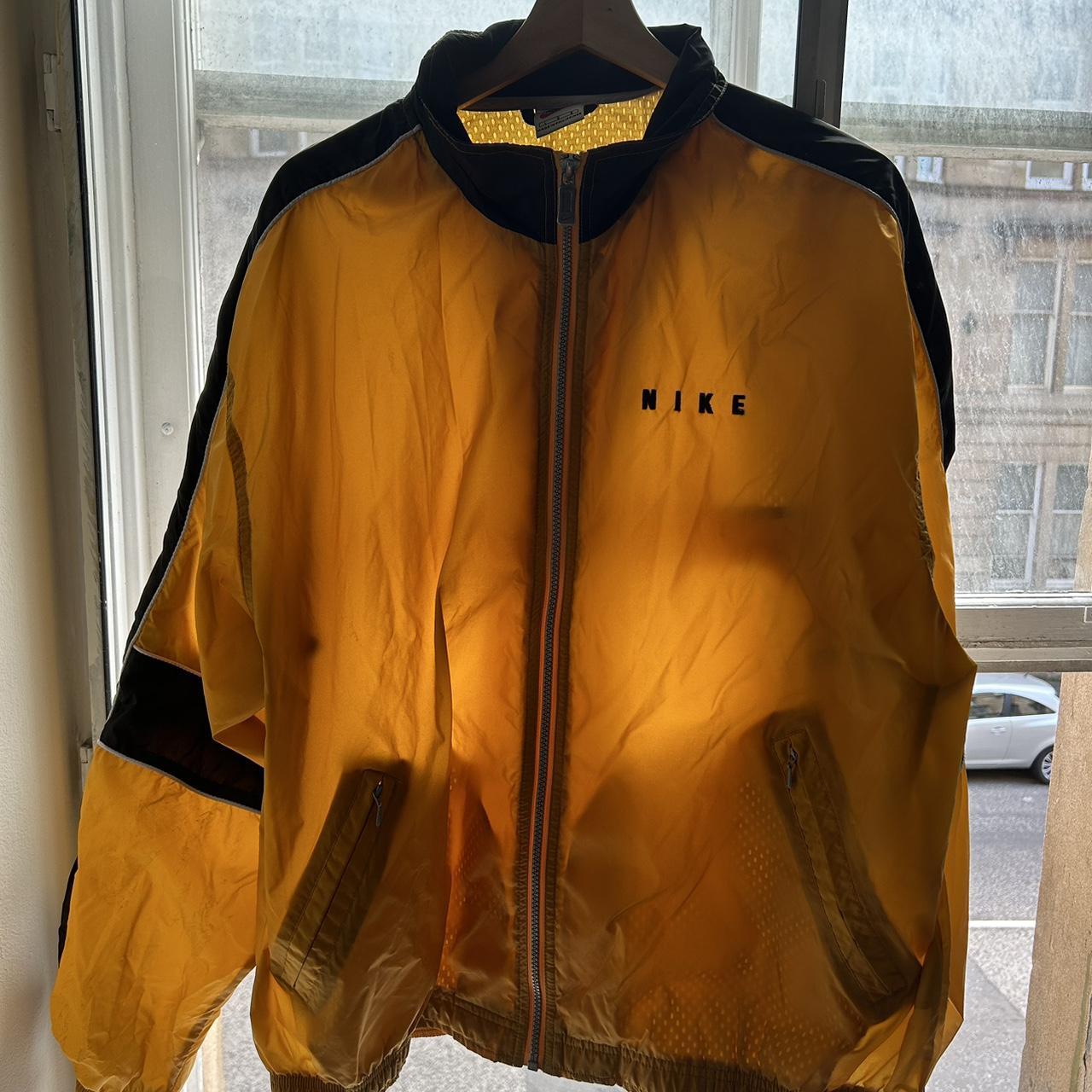 Nike mustard yellow windbreaker size L. Really cool