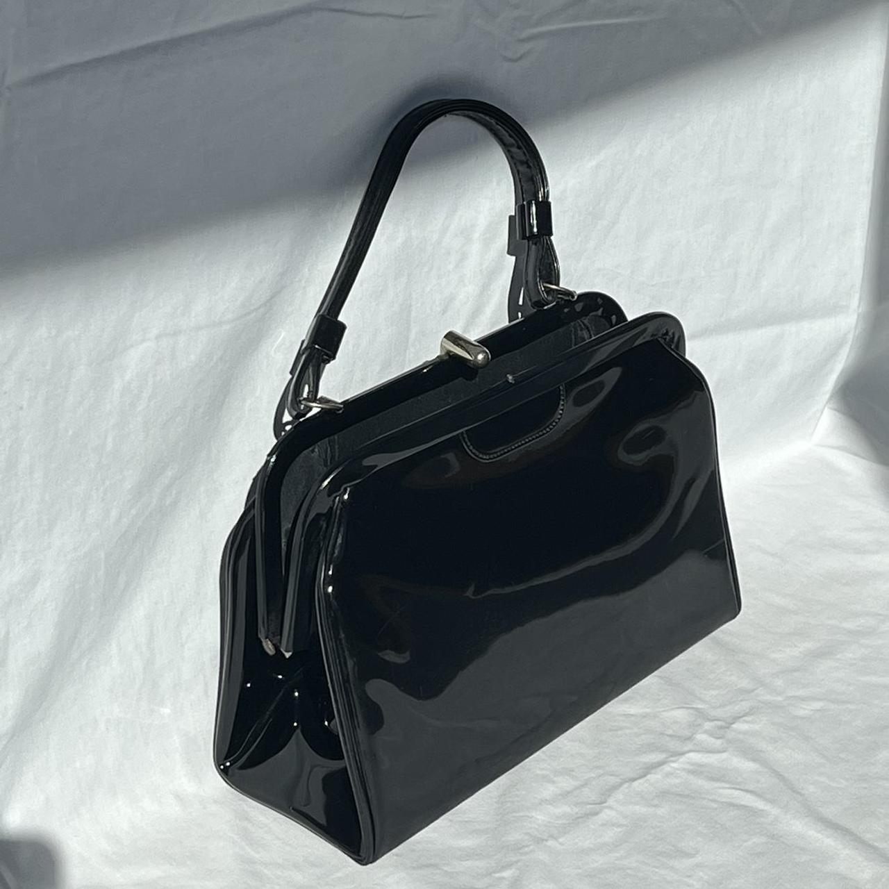 black vinyl purse with silver hardware ♡... Depop