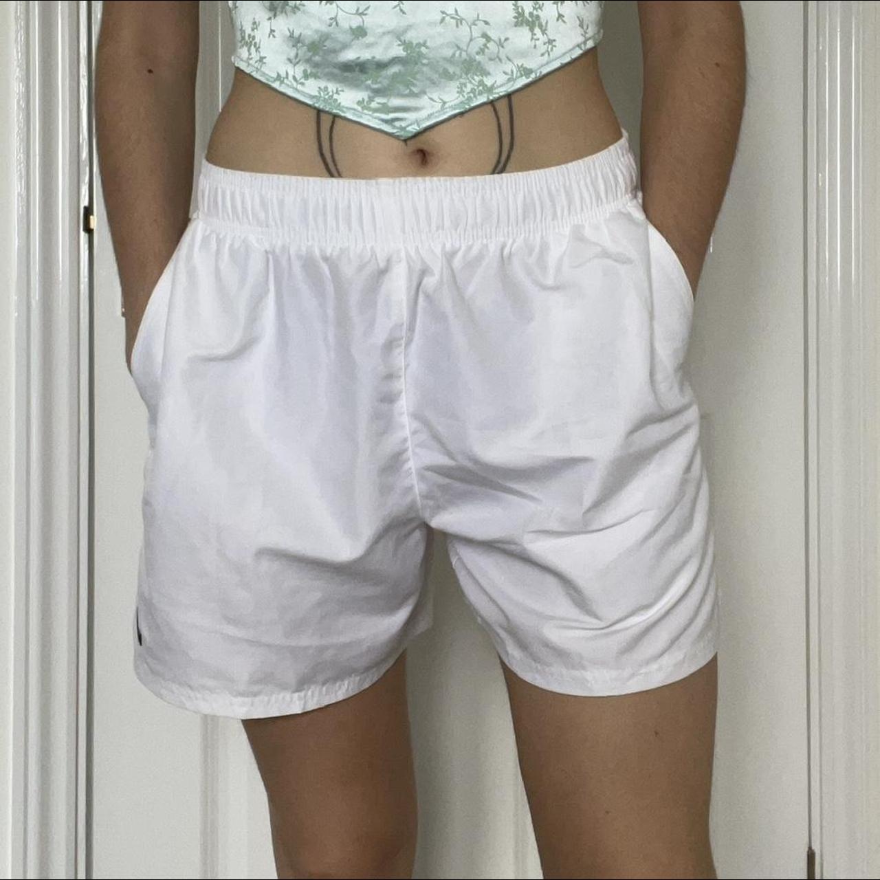 Nike white athletic shorts. Elasticated waist with... Depop