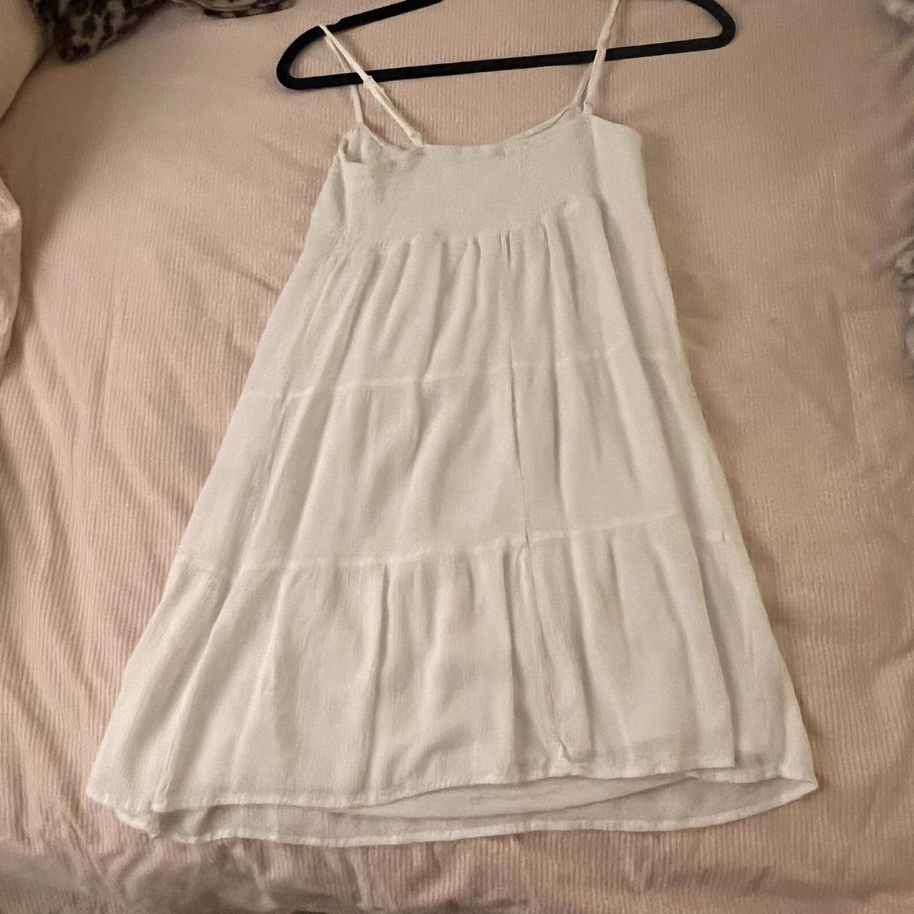 Mini white flow summer dress. Cinching at the top... - Depop