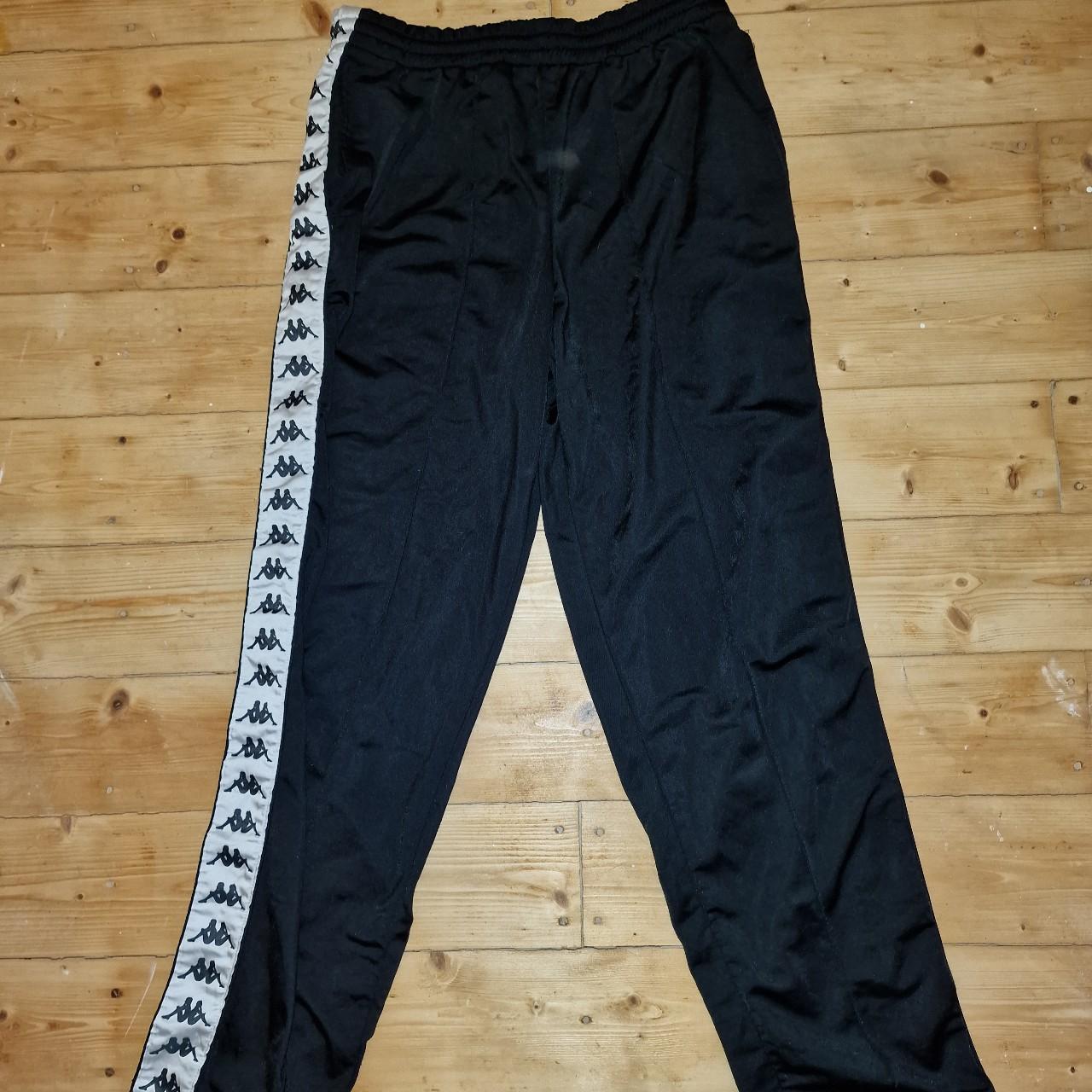 Kappa Tracksuit Bottoms. Tape logo down each... Depop