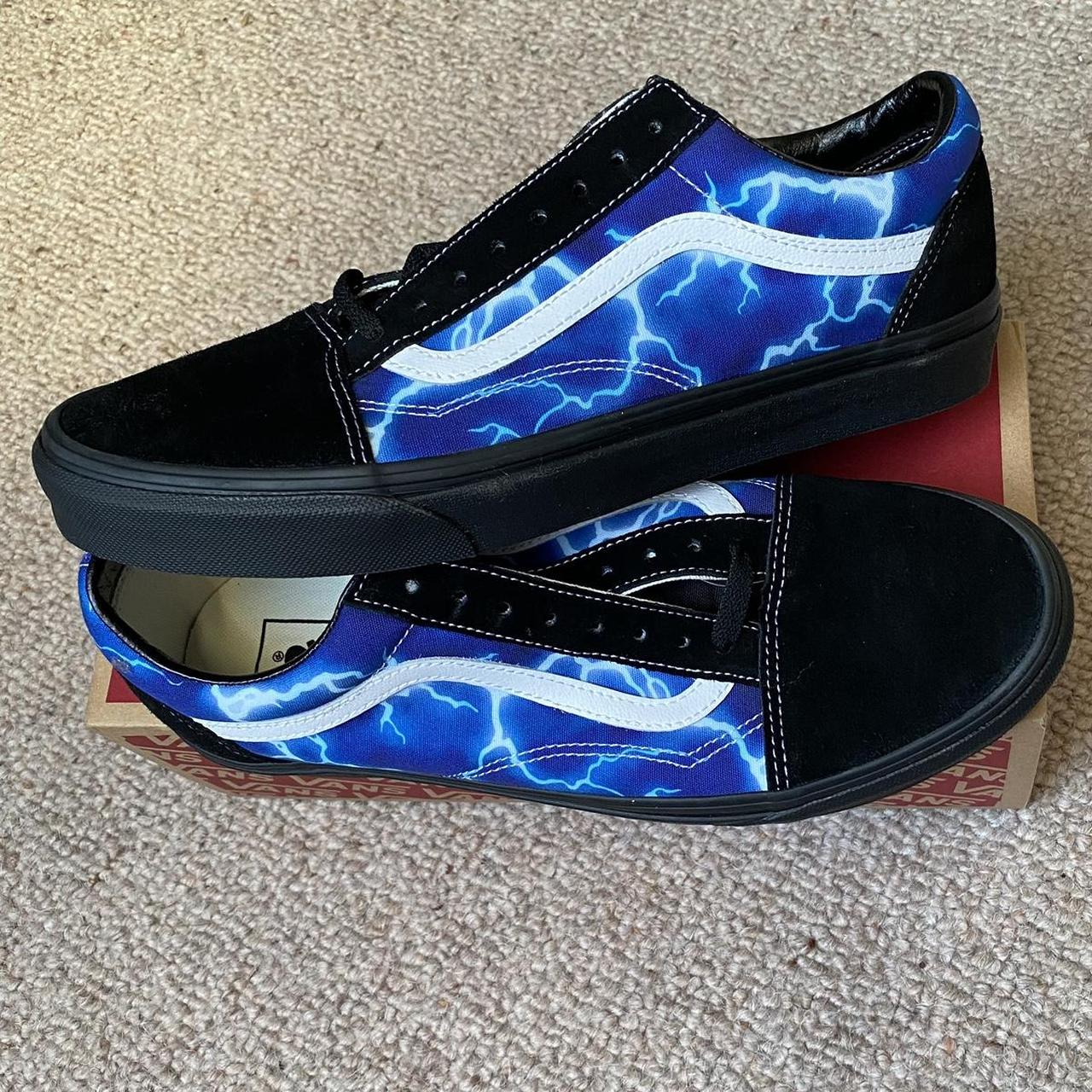 Blue vans store with lightning bolt