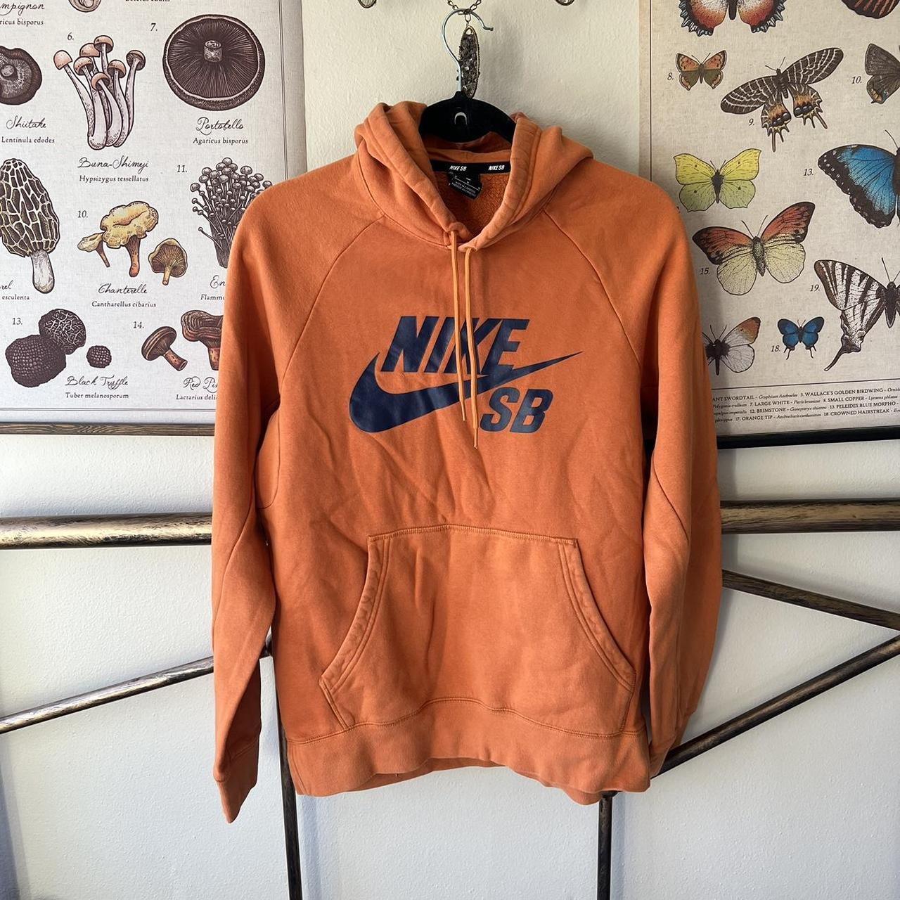 Black hoodie discount with orange writing