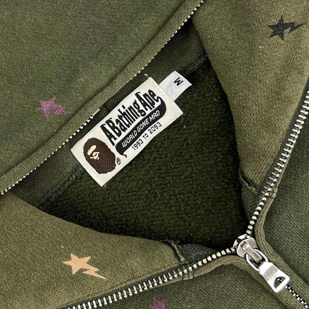 A・BATHING APE】WORLD GONE MAD ZIP HOODIE｜トップス