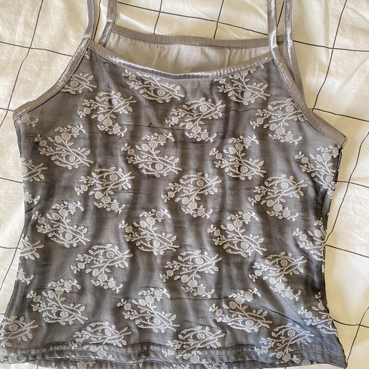 Small silver vest top, perfect for summer. One strap... - Depop