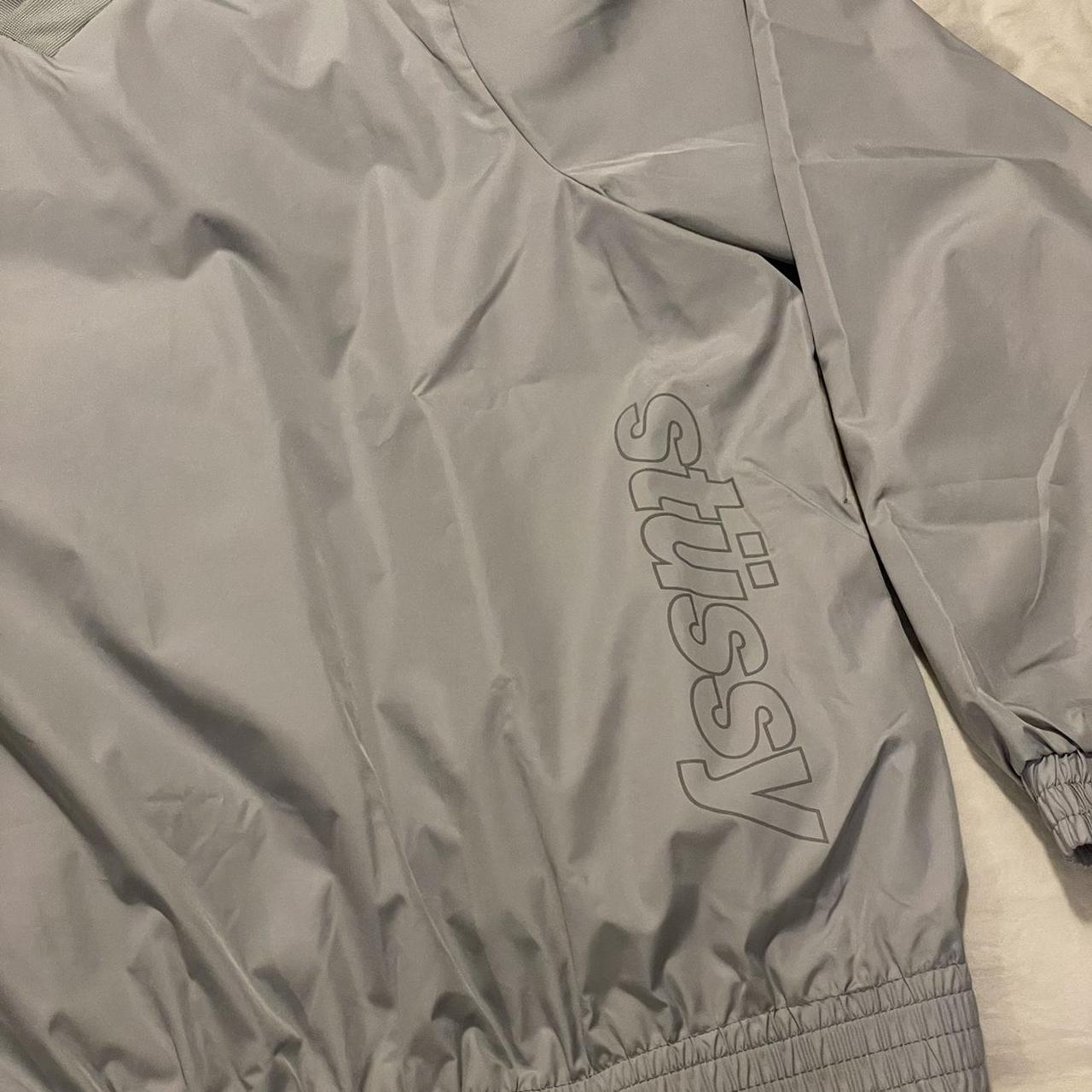 Stussy pullover windbreaker jacket. Grey, spellout... - Depop