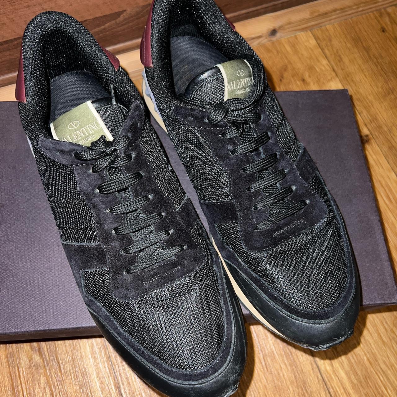 triple black valentino trainers