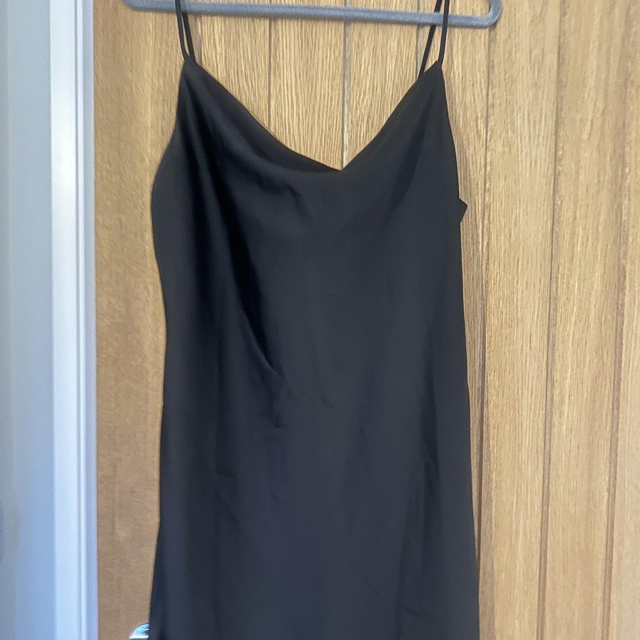 Black satin cowl neck mini dress from urban... - Depop