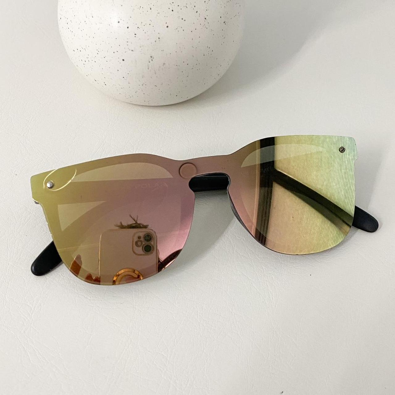 Rimless wayfarer style sunglasses with pink green