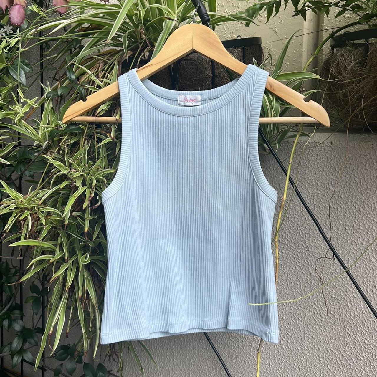 Lily loves baby blue tank top Size 6 but fits a... - Depop
