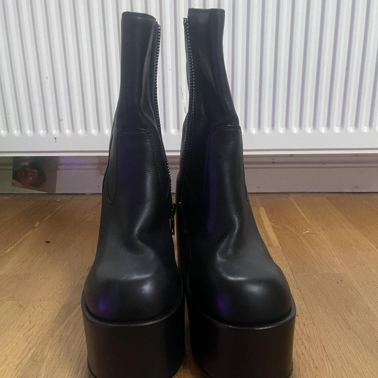 Naked Wolfe Women's Black Boots | Depop