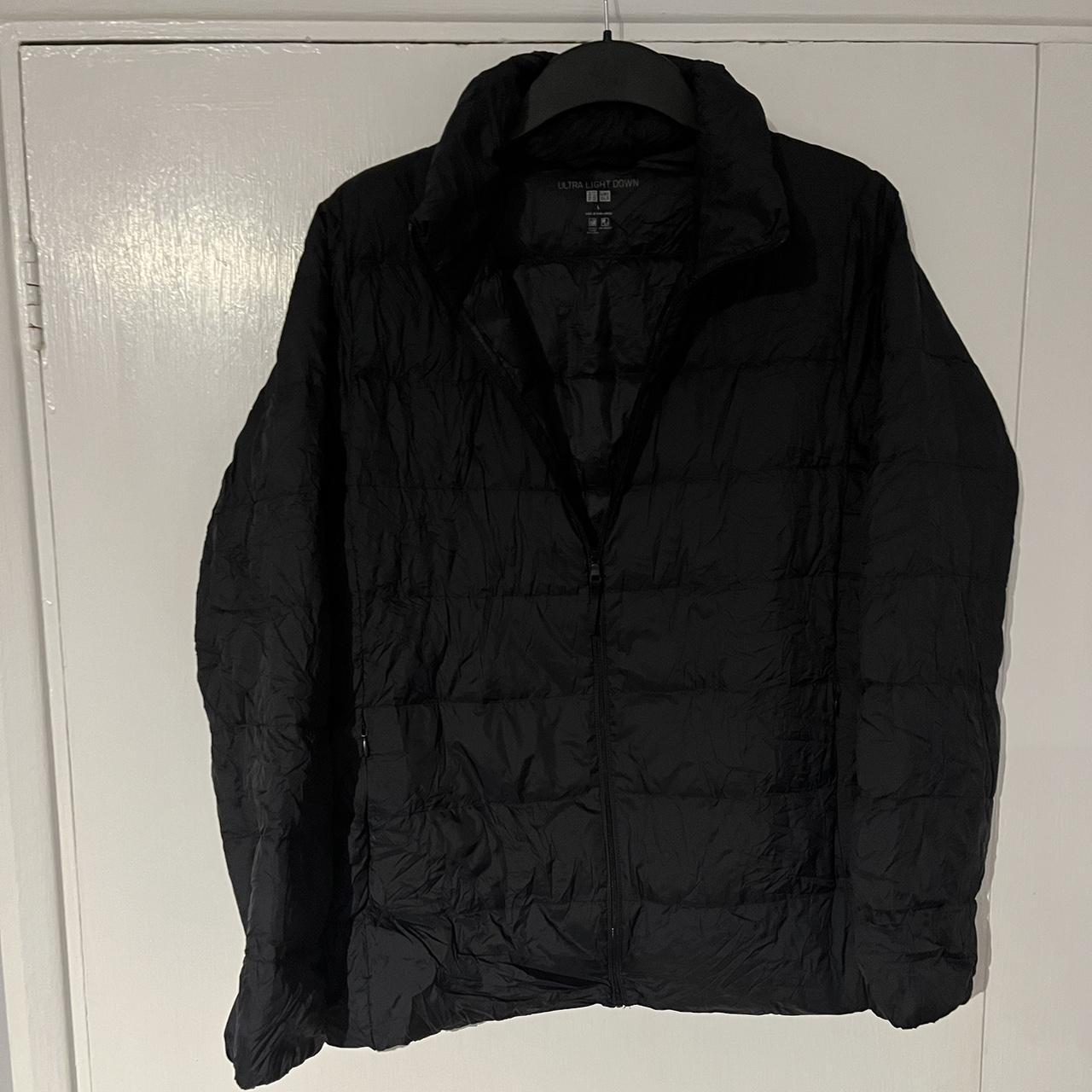 Uniqlo ultra light down jacket in black Worn maybe... - Depop