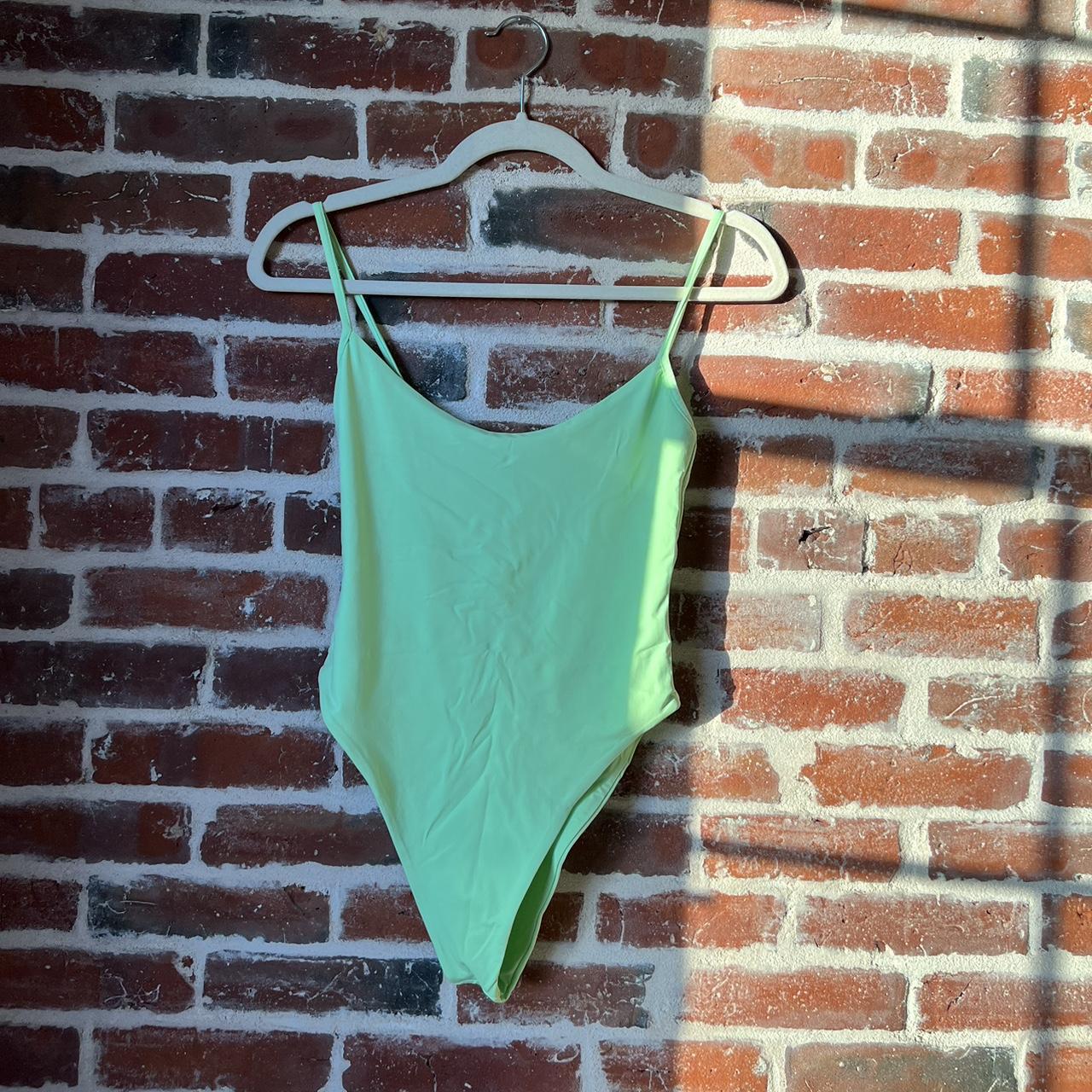 high hip one piece bathing suit from TOAST in a... - Depop