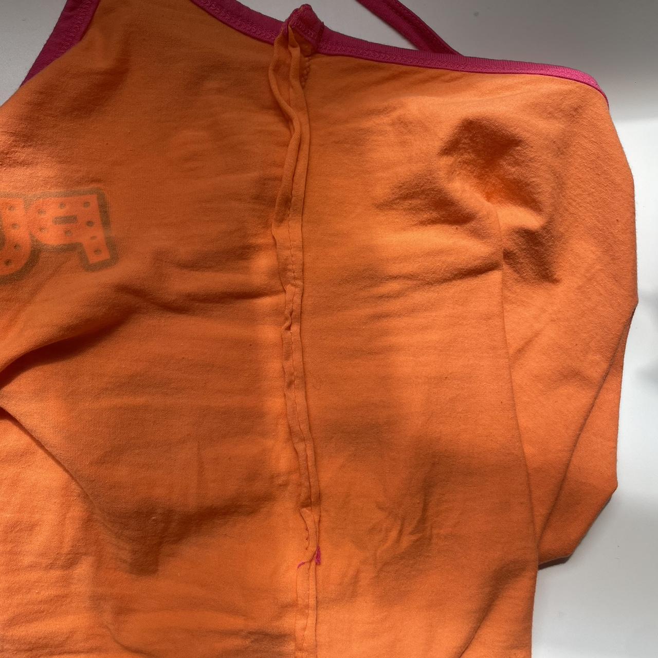 Authentic Playboy orange vest with pink crossback... Depop
