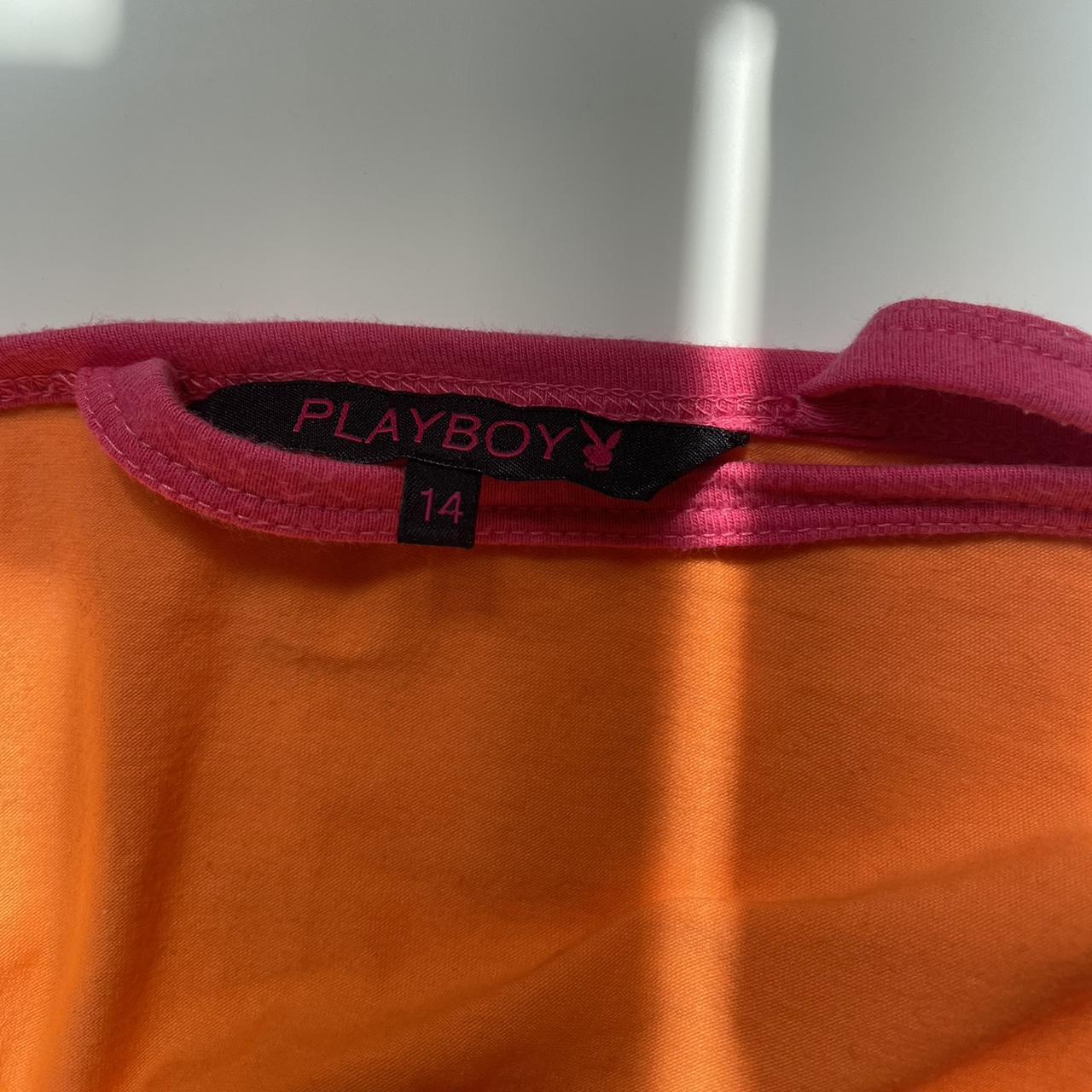 Authentic Playboy orange vest with pink crossback... Depop