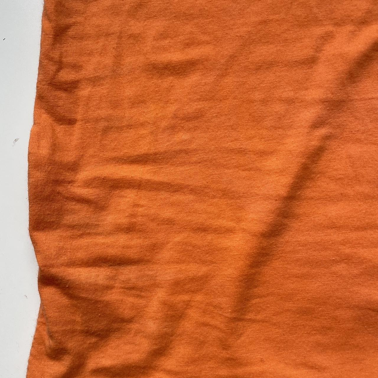 Authentic Playboy orange vest with pink crossback... Depop