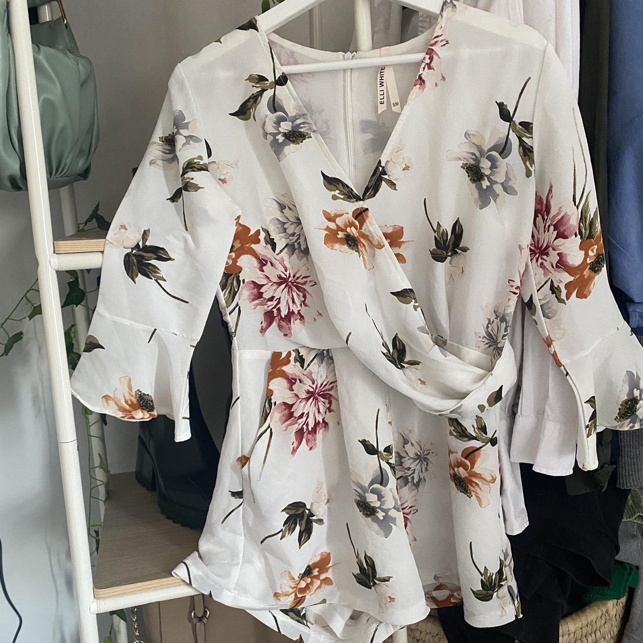 Elli White floral long sleeve summer playsuit, size... - Depop